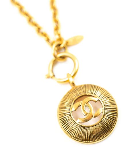 chanel sunburst necklace|Chanel ring necklace.